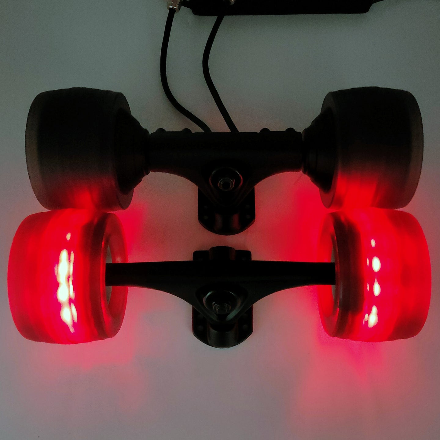 Upgrade your ride with 105mm AT Glow Wheels and Sleeves for Electric Skateboard - Illuminate your path with these high-performance all-terrain wheels, equipped with vibrant glow technology. The set includes durable sleeves for a smooth and stylish ride, perfect for enhancing your electric skateboard experience.